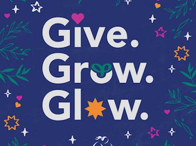 Dark blue background with words give. grow. glow.